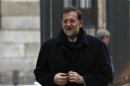 Spain's Prime Minister Mariano Rajoy arrives at parliamentary session for the formal approbation of the budget for 2013 at Parliament in Madrid