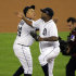 Detroit Tigers relief pitcher Jose Valverde, right, and teammate Miguel Cabrera celebrate after the last out in the ninth inning of Game 1 of the American League division baseball series against the Oakland Athletics, Saturday, Oct. 6, 2012, in Detroit. The Tigers won 3-1. (AP Photo/Carlos Osorio)