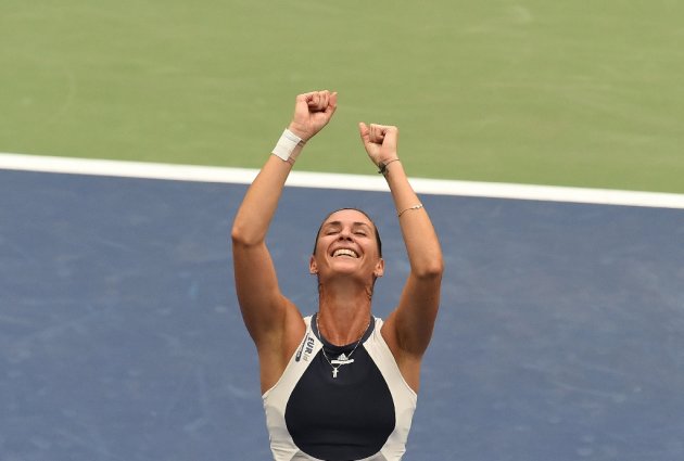 Flavia Pennetta of Italy celebrates defeating her compatriot Roberta Vinci during their 2015 US Open Women's singles final match at the USTA Billie Je...