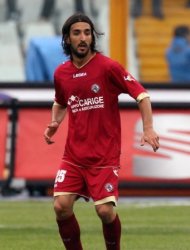 Livorno midfielder Piermario Morosini in action during a second league match against Pescara where he suffered a suspected heart-attack in Pescara. The 31-year-old player has died after he collapsed suddenly on the pitch during the game