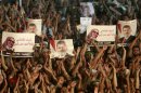 Supporters of deposed Egyptian President Mohamed Mursi shout slogans during a protest at the Rabaa Adawiya square, where they are camping, in Cairo