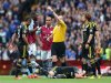 Aston Villa's Christian Benteke, second left, is shown a red card by referee Lee Mason after a challenge on Chelsea's John Terry, on the ground, during the English Premier League soccer match at Villa Park, Birmingham, England, Saturday May 11, 2013. Chelsea won the match 1-2. (AP Photo/PA, Nick Potts) UNITED KINGDOM OUT  NO SALES  NO ARCHIVE