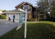 A realtor shows a home in Riverside, California May 24, 2012. REUTERS/Alex Gallardo