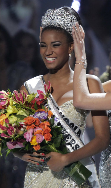 Miss Angola Leila Lopes is crowned Miss Universe 2011 by Miss Universe 2010 Ximena Navarrete, of Mexico, in Sao Paulo, Brazil, Monday Sept. 12, 2011. (AP Photo/Andre Penner)