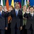 President Barack Obama takes his place with other leaders for the Family Photo during the G20 Summit, Monday, June 18, 2012, in Los Cabos, Mexico. From left, Indonesian President Susilo Bambang Yudhoyono, U.S. President Barack Obama, German Chancellor Angela Merkel, Chinese President Hu Jintao, Indian Prime Minister Manmohan Singh. (AP Photo/Carolyn Kaster)