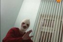 In this video grab provided by RenTV via APTN, artistic director of the Bolshoi ballet Sergei Filin gestures in a hospital in Moscow, Friday, Jan. 18, 2013 where he is being treated. Filin, a 42-year-old former Bolshoi star, said a man threw the acid into his face late Thursday near the gate of his apartment building in central Moscow. Colleagues said Friday the could be in reprisal for his selection of dancers in starring roles at the famed Russian company. (AP Photo/RenTV) TV OUT