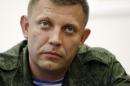 Alexander Zakharchenko, who has been put forward as the new prime minister of the self-declared Donetsk People's Republic, attends a press conference in Donetsk, eastern Ukraine,Thursday, Aug. 7, 2014. Outgoing prime minister Alexander Borodai announced he was resigning Thursday and that he would act as an adviser to Zakharchenko, once he has been confirmed by the separatist legislature. (AP Photo/Sergei Grits)