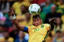 Neymar heads the ball during Brazil's first round group A match against Iraq in Brasilia on August 7, 2016