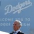 Los Angeles Dodgers owner Frank McCourt listens at a news conference about increased security at Dodger Stadium in Los Angeles