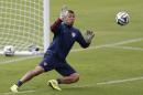 United States' goalkeeper Nick Rimando makes a save during a training session at the Sao Paulo FC training center in Sao Paulo, Brazil, Wednesday, June 11, 2014. The U.S. will play in group G of the 2014 soccer World Cup. (AP Photo/Julio Cortez)