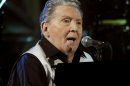 FILE - In this Oct. 30, 2009 file photo, Jerry Lee Lewis performs at the 25th Anniversary Rock & Roll Hall of Fame concert at Madison Square Garden in New York. Lewis has married for a seventh time in Mississippi, and the new bride is his cousin's ex-wife. The Adams County circuit clerk's office said the marriage license shows Lewis was married March 9 to Judith Ann Coghlan Brown. The 76-year-old Lewis, also known as 