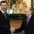 FILE  In this Tuesday, Dec. 19, 2006 file photo Vladimir Putin, then Russian President, right, and his Syrian counterpart Bashar Assad smile as they shake hands in Moscow's Kremlin. Russia defied international efforts to end a crackdown on civilians by Assad regime, shielding it from the United Nations sanctions and providing it with weapons. (AP photo/RIA Novosti, Mikhail Klimentyev, Presidential Press service, file)