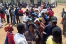 Voters queue at a polling station in Mbabane on September 19, 2008 during parliamentary polls