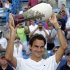 Federer of Switzerland holds up the championship trophy after defeating Djokovic of Serbia in the championship match at the men's Cincinnati Open tennis tournament in Cincinnati