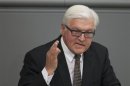 SPD faction leader Steinmeier responds to German Chancellor Merkel's government statement on her policy plans for upcoming G-20 summit in Bundestag in Berlin