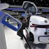 The electric Nils concept car by German car maker Volkswagen is connected to a charging station