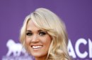 Carrie Underwood arrives at the 47th Annual Academy of Country Music Awards on Sunday, April 1, 2012 in Las Vegas. (AP Photo/Isaac Brekken)