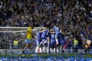 Chelsea players celebrate after the English Premier League soccer match between Chelsea and Crystal Palace at Stamford Bridge stadium in London, Sunday, May 3, 2015. Chelsea won the match 1-0 to secure Premier League title with 3 games to spare. (AP Photo/Kirsty Wigglesworth)