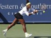 Serena Williams of the U.S. returns a shot to Angelique Kerber of Germany in their women's singles quarter-final match at the Cincinnati Open tennis tournament in Cincinnati
