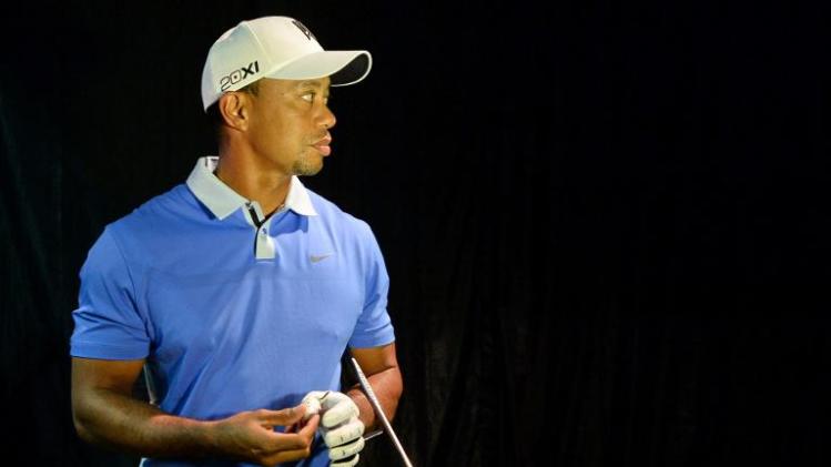 World number one golfer, Tiger Woods, attends a golf clinic session with young athletes from the Singapore Sports School, on November 1, 2013