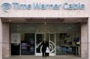 A customer leaves a Time Warner Cable store in Palm Springs