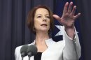 FILE - In this Thursday, Oct. 11, 2012 file photo, Australian Prime Minister Julia Gillard gestures during a joint press conference with Singapore Prime Minister Lee Hsien Loong at Parliament House in Canberra, Australia. Australia's political landscape seemed upside down. Gillard, whose party is widely expected to lose elections next year, was eviscerating the man who seems destined to replace her. (AP Photo/Penny Bradfield)