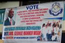A campaign poster for retired footballer George Weah, one of 139 candidates in elections to Liberia's Senate