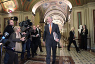 <p>               Sen. Rob Portman, R-Ohio, arrives for a meeting with bi-partisan members of the supercommittee on Capitol Hill in Washington, Friday, Nov. 18, 2011.  (AP Photo/J. Scott Applewhite)