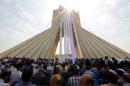 Iranians gather at Tehran's Azadi Square (Freedom Square) on June 30, 2015, to unveil a petition in support of the Iranian team pursuing a nuclear agreement with world powers