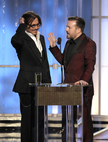 In this image released by NBC, presenter Johnny Depp, left, and host Ricky Gervais are shown during the 69th Annual Golden Globe Awards on Sunday, Jan. 15, 2012 in Los Angeles. (AP Photo/NBC, Paul Drinkwater)
