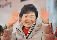 South Korean presidential candidate Park Geun-Hye of the ruling New Frontier Party waves to supporters at an election campaign rally in Seoul on December 15, 2012. If Park is elected South Korea's first-ever woman president on Wednesday, she will lead a country that is ranked below the likes of Suriname and the United Arab Emirates in gender equality