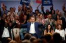 French Economy Minister Emmanuel Macron attends a political rally for his recently launched political movement, En Marche!, or Forward!, in Paris