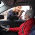 The Rev. Patricia Anderson Cook gives the blessing to Suzanne Reichart as she sits inside her car during drive thru Ash Wednesday services at Mt. Healthy United Methodist Church, Wednesday, Feb. 22, 2012, in Mt. Healthy, Ohio. (AP Photo/Al Behrman)