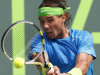 Rafael Nadal, of Spain, returns a shot from Kei Nishikori, of Japan, during the Sony Ericsson Open tennis tournament, Tuesday, March 27, 2012, in Key Biscayne, Fla. (AP Photo/Wilfredo Lee)