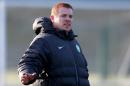 Celtic's manager Neil Lennon attends a training session at Lennoxtown training facility, near Glasgow, Scotland, on November 25, 2013