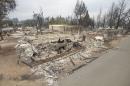 Leveled homes line Jefferson St. after the Valley Fire raged through Middleton