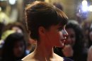 Actress Felicity Jones poses for photographers at the world Premiere of 'Chalet Girl' in London