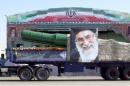 Military truck carrying a missile and a picture of Iran's Supreme Leader Ayatollah Ali Khamenei is seen during a parade marking the anniversary of the Iran-Iraq war (1980-88), in Tehran