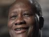 Ivory Coast President Alassane Ouattara smiles during an interviewed with The Associated Press, Friday, July 29, 2011, in Washington. (AP Photo/Cliff Owen)