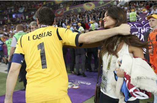 Spain's Casillas is congratulated by girlfriend Carbonero after defeating Italy to win Euro 2012 final in Kiev