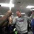 Baltimore Ravens head coach John Harbaugh celebrates in the dressing room after his team defeated the New England Patriots in the NFL AFC Championship football game in Foxborough