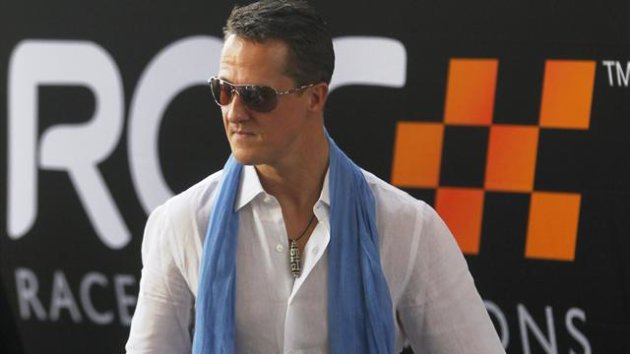 Driver Michael Schumacher from Team Germany arrives at the Rajamangala National Stadium before a practice for the Race of Champions (ROC) in Bangkok December 16, 2012. (Reuters)