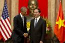 Obama lifts decades-old arms ban in his 1st visit to Vietnam