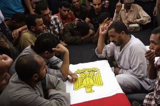 صور/ تغطية أخبارية /جنازة العسكريين المصريين 000-Nic6121987-jpg_062419