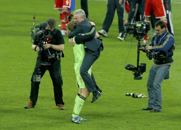 Bayern Munich's coach Jupp Heynckes celebrates with goalkeeper Manuel Neuer after they defeated Borussia Dortmund in their Champions League Final soccer match at Wembley Stadium in London