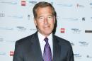 FILE - This Sept. 11, 2012 file image released by Starpix shows Brian Williams at the Cantor Fitzgerald Charity Day event in New York. NBC "NBC "Nightly News" anchor Williams has admitted he spread a false story about being on a helicopter that came under enemy fire while he was reporting in Iraq in 2003. Williams said on "Nightly News" on Wednesday, Feb. 4, 2015, he was in a helicopter following other aircraft, one of which was hit by ground fire. His helicopter was not hit. (AP Photo/Starpix, Andrew Toth, File)