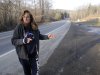In this photo taken Wednesday, Jan. 25, 2012, Lisa Richlin stands in front of her home along Route 220 near Laporte, Pa., while talking about the number of accidents there. Richlin is in court with Central New York Oil and Gas Company LLC on trying to get them to move a proposed entrance road for building the MARC 1 pipeline from a couple hundred yards north of her home along Route 220 to a site a couple hundred yards south of her home. (AP Photo/Jimmy May)