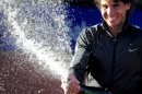 Spanish Rafael Nadal sprays cava after winning the final of the Barcelona Open