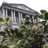 The Bank of England is seen behind holly bushes in the City of London