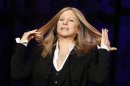 Singer and actress Barbra Streisand reacts as she speaks on stage at the Public Counsel's 40th anniversary event in Beverly Hills